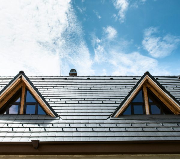 Laying roof tiles on new build house